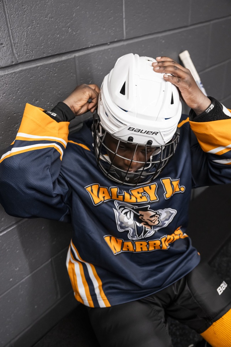 Player pulling on the RE-AKT 3D helmet